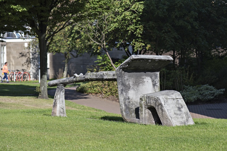 Abstract aluminium sculpture with long horizontal form.